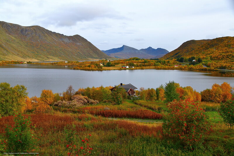 Autumn landscape with lake and mountains
