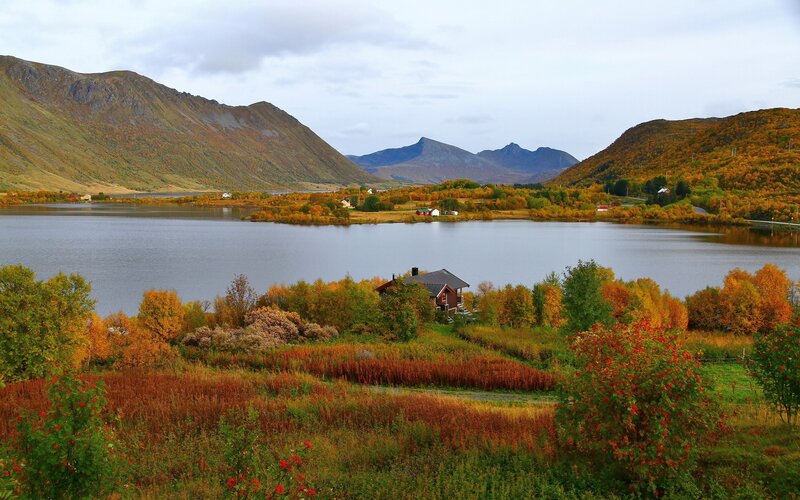 Autumn landscape with lake and mountains