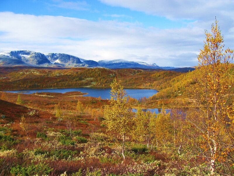 Autumn landscape with lake and mountains
