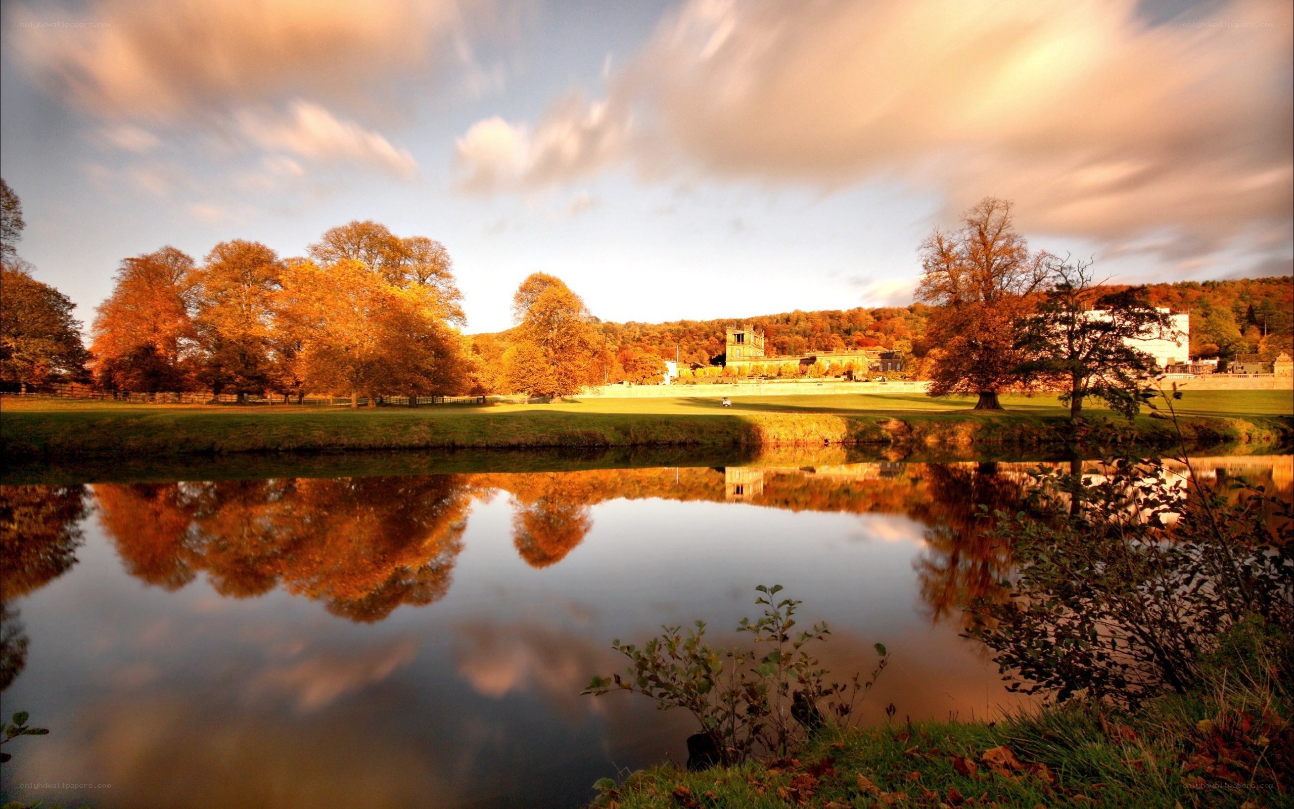 Autumn landscape with lake reflection