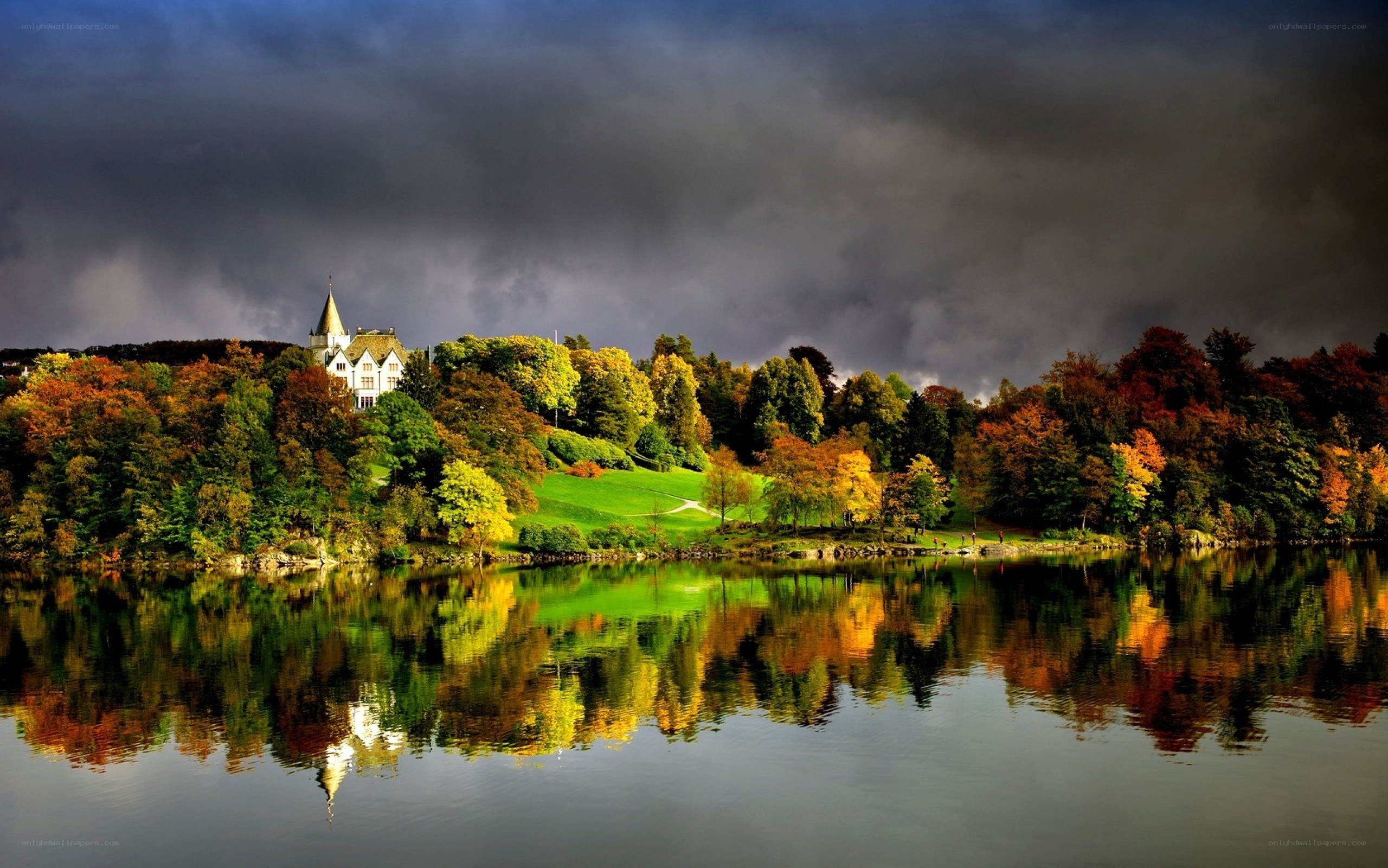 Autumn landscape with lake reflection