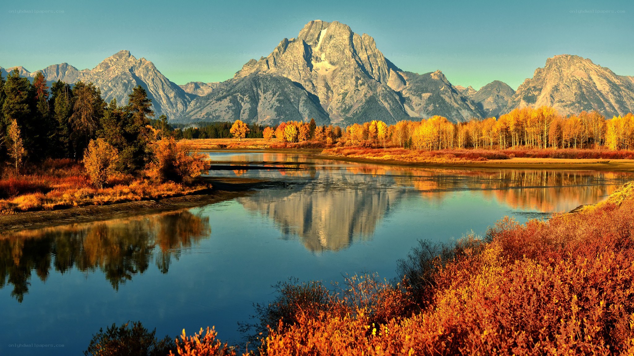 Autumn landscape with mountain reflection