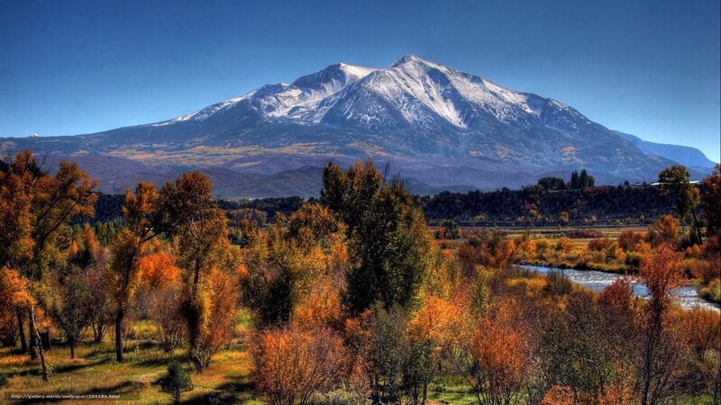 Autumn landscape with snow-capped mountain