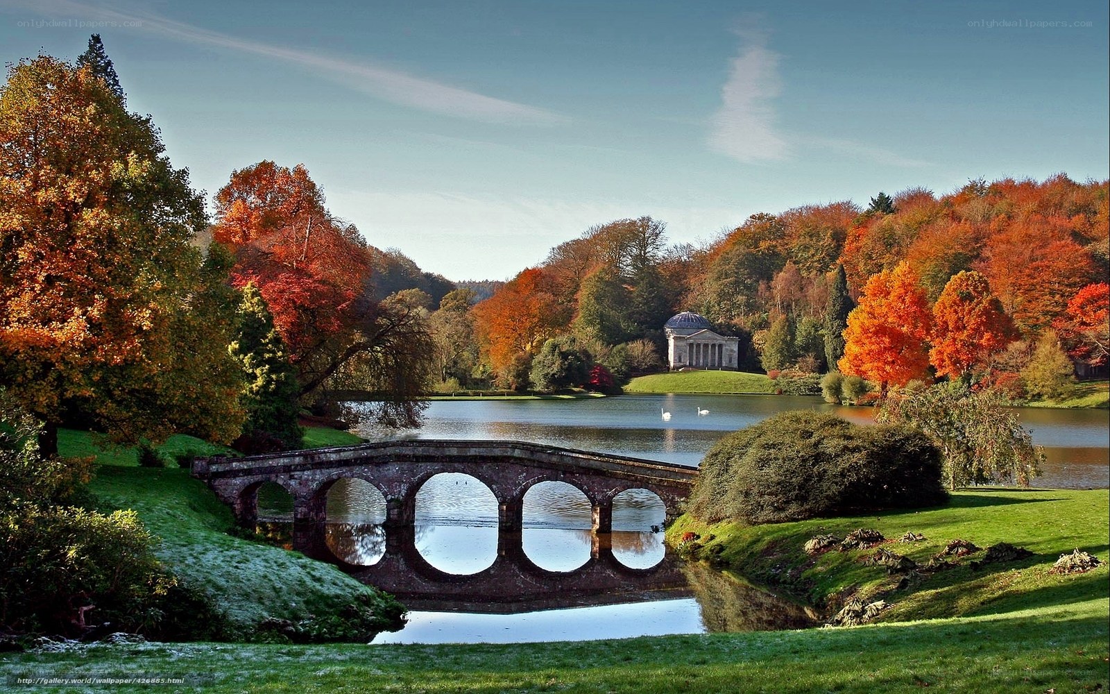 Autumn landscape with stone bridge