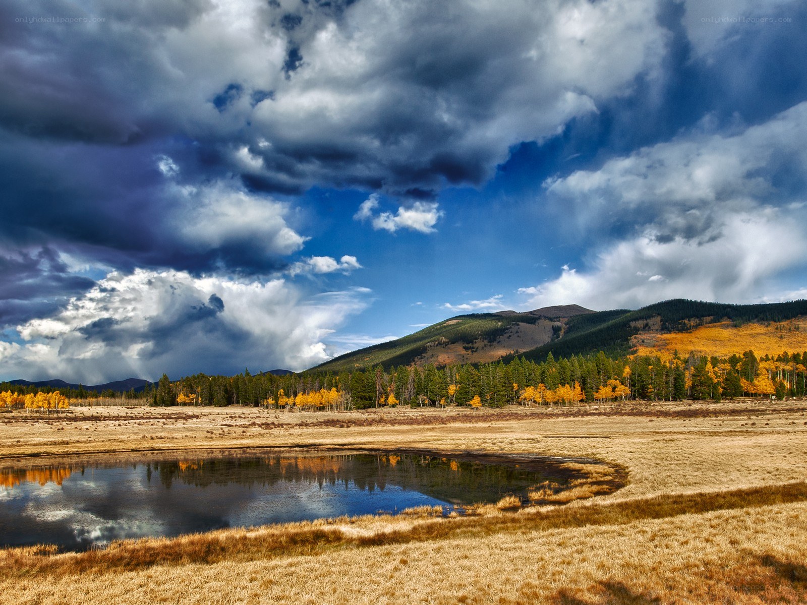 Autumn landscape with stormy sky