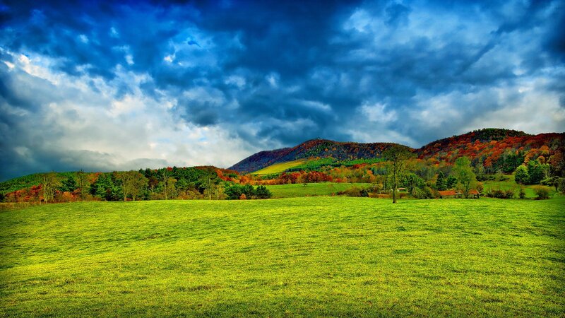 Autumn landscape with stormy sky