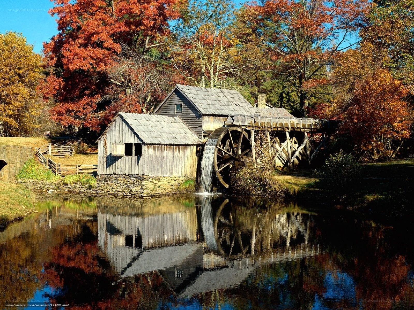 Autumn mill by the river