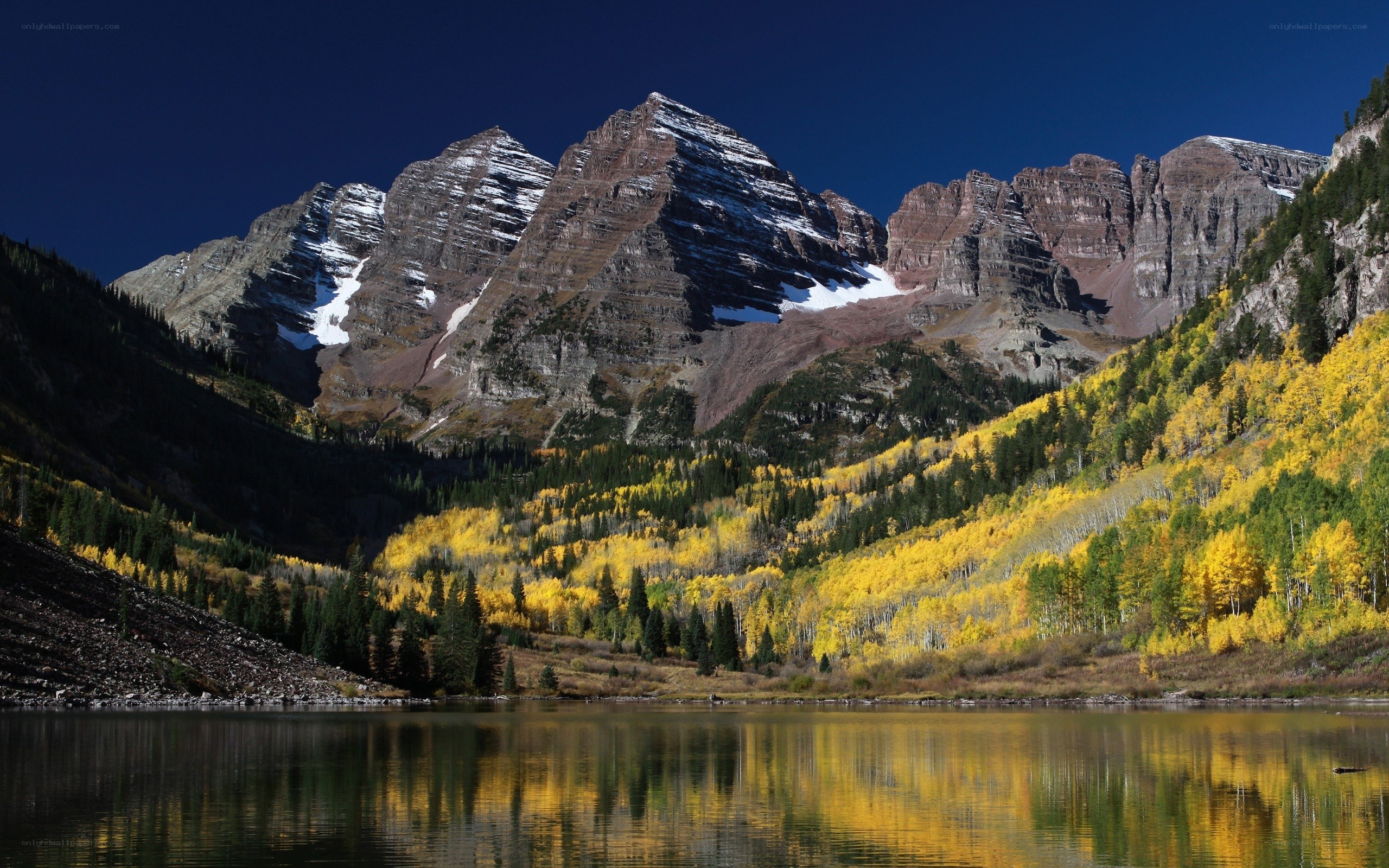 Autumn mountains reflected in a lake