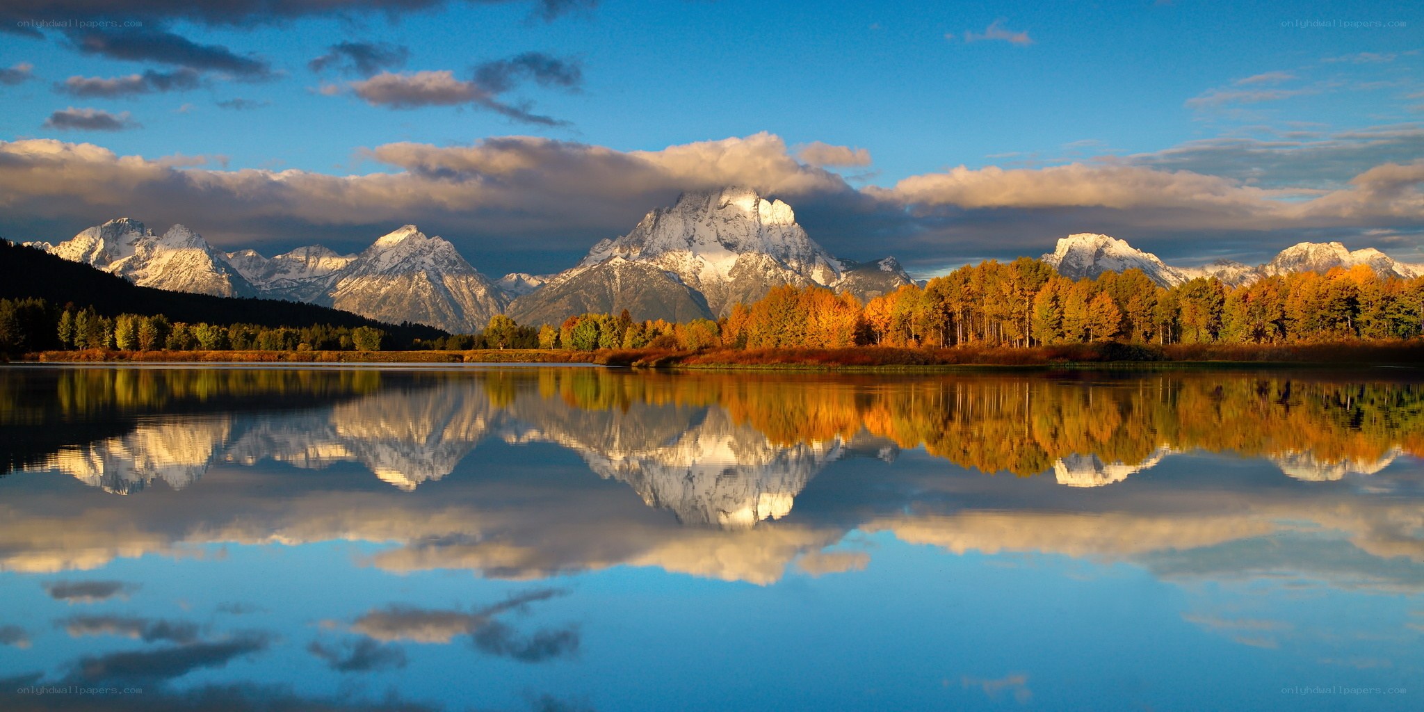 Autumn mountains reflected in a lake