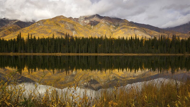 Autumn mountains reflected in a lake