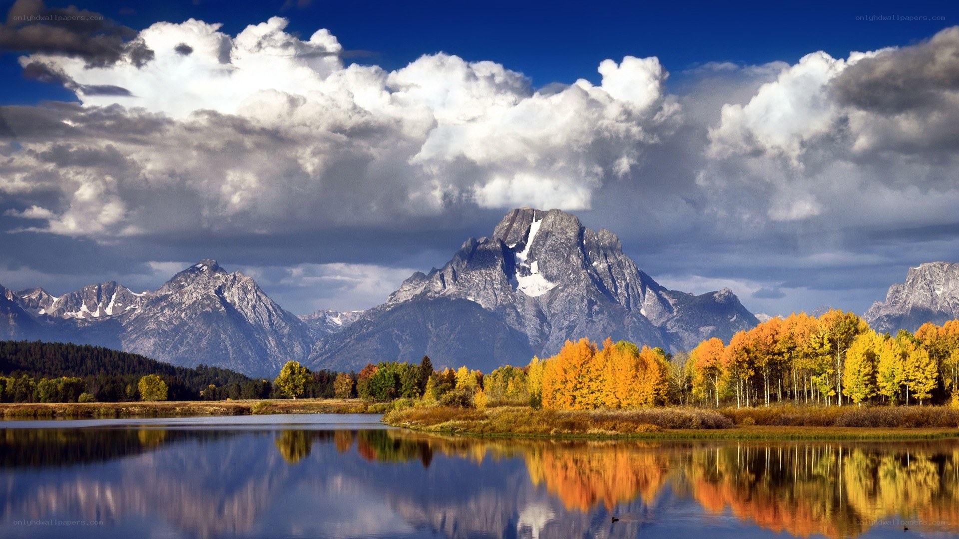 Autumn mountains reflected in a lake