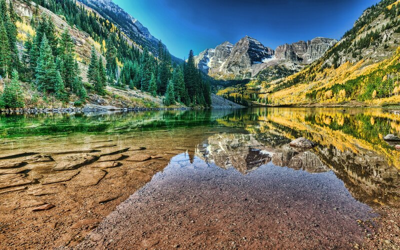Autumn mountains reflected in a lake