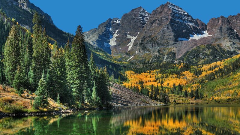 Autumn mountains reflected in a lake