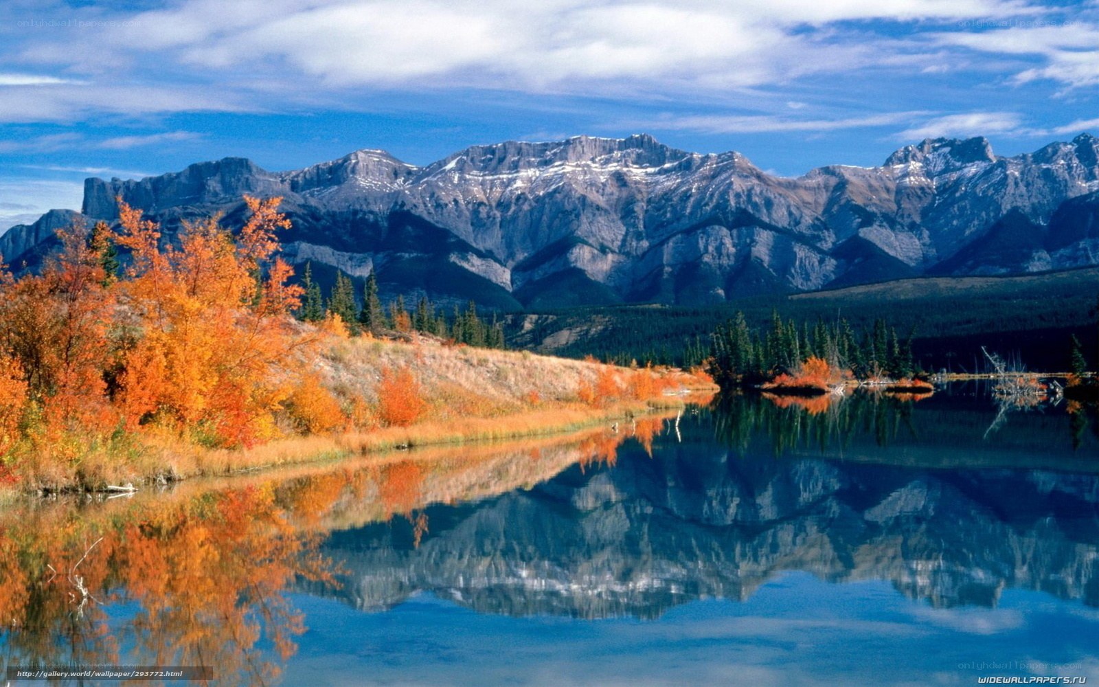 Autumn mountains reflected in lake