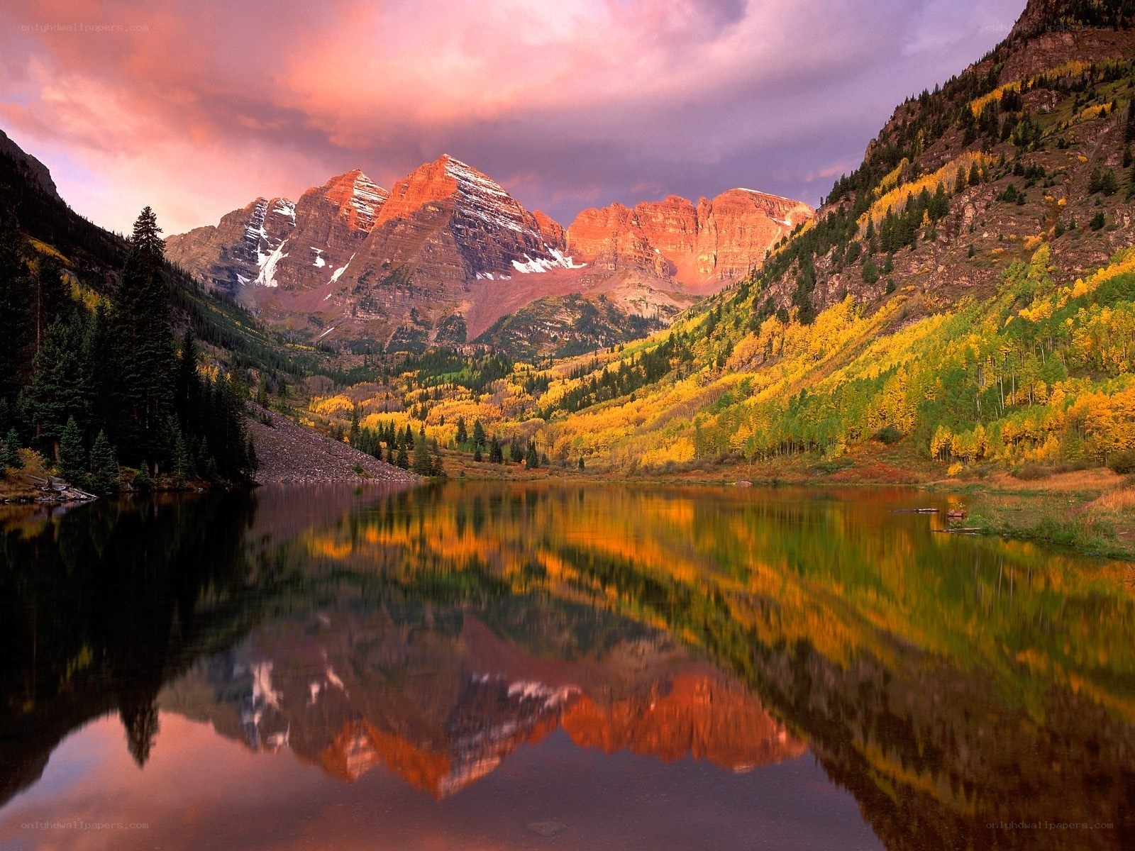 Autumn mountains reflected in lake