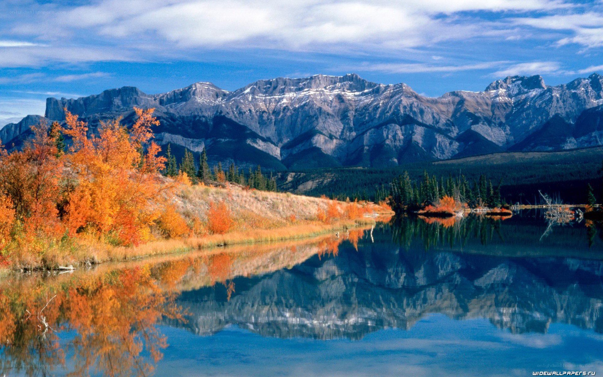 Autumn mountains reflected in lake