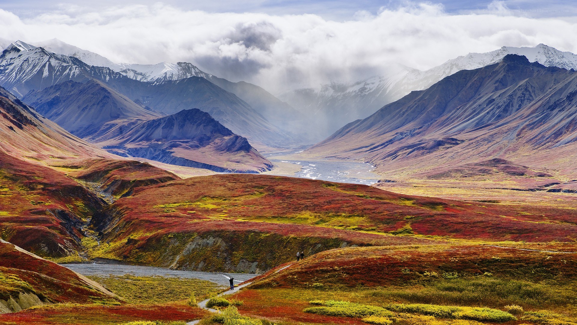 Autumn mountains with hikers