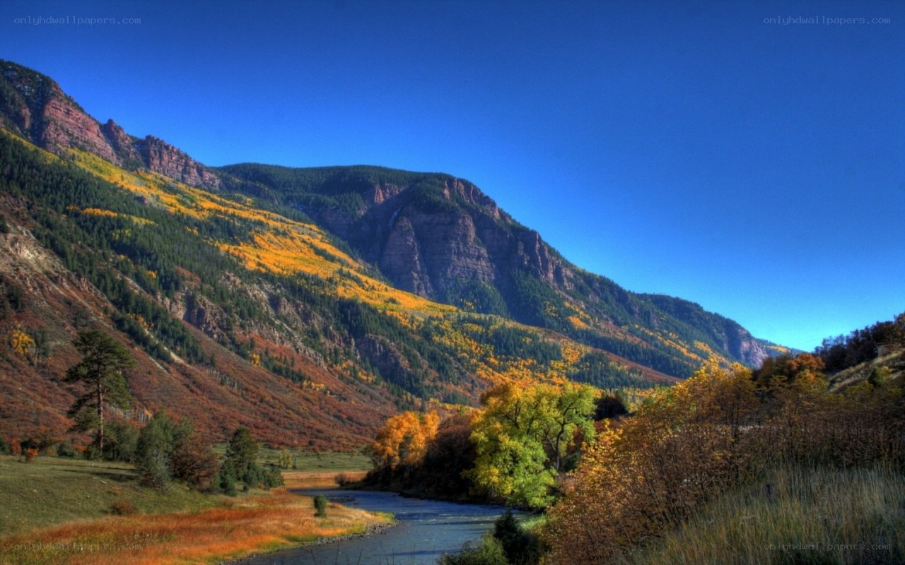 autumn mountains with river