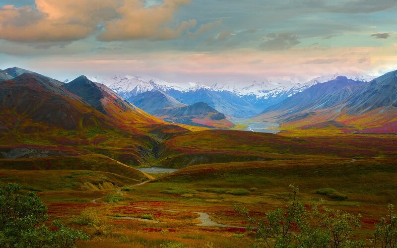 Autumn mountains with snow-capped peaks