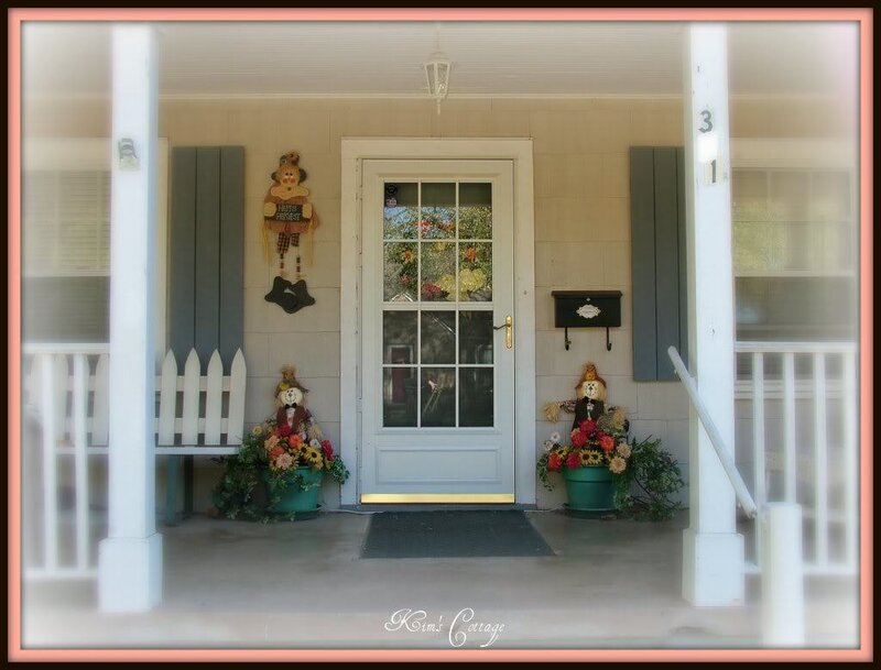 Autumn porch with scarecrows