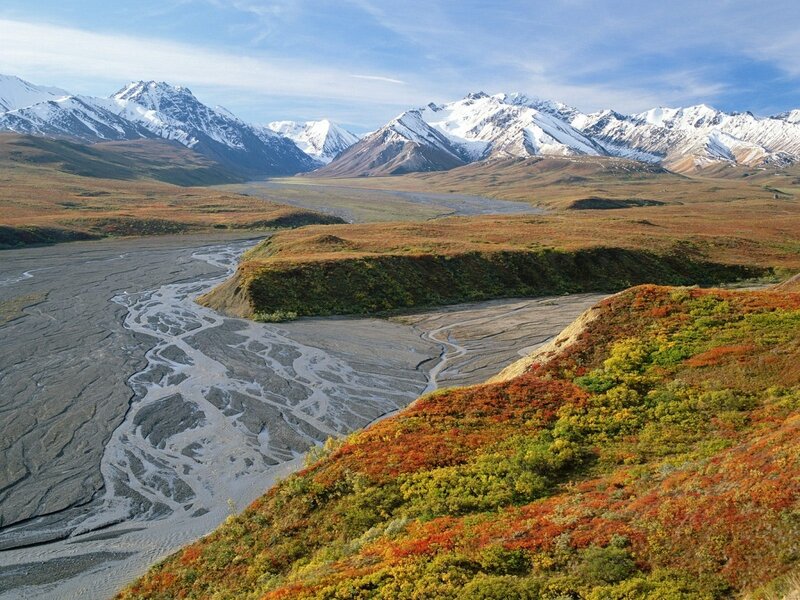 Autumn river in mountain valley