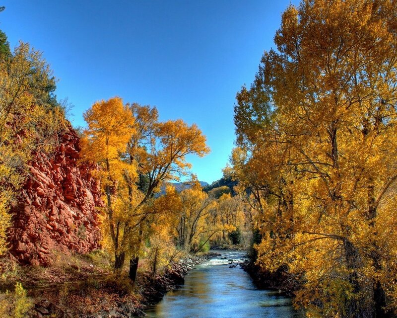 Autumn river in red rock canyon