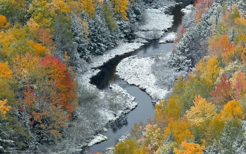 Autumn river with snow