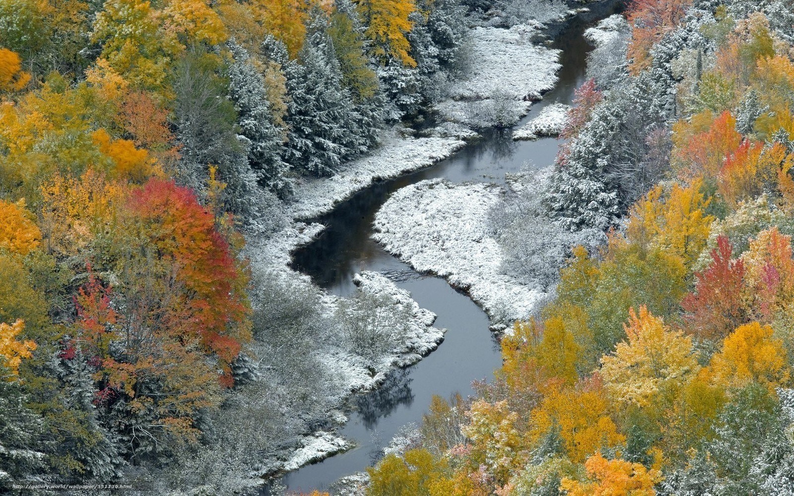 Autumn river with snow
