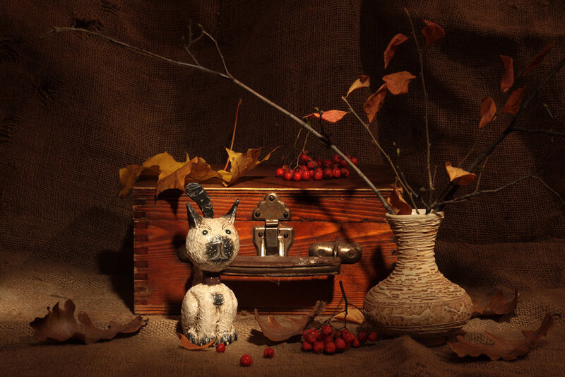 Autumn still life with figurine