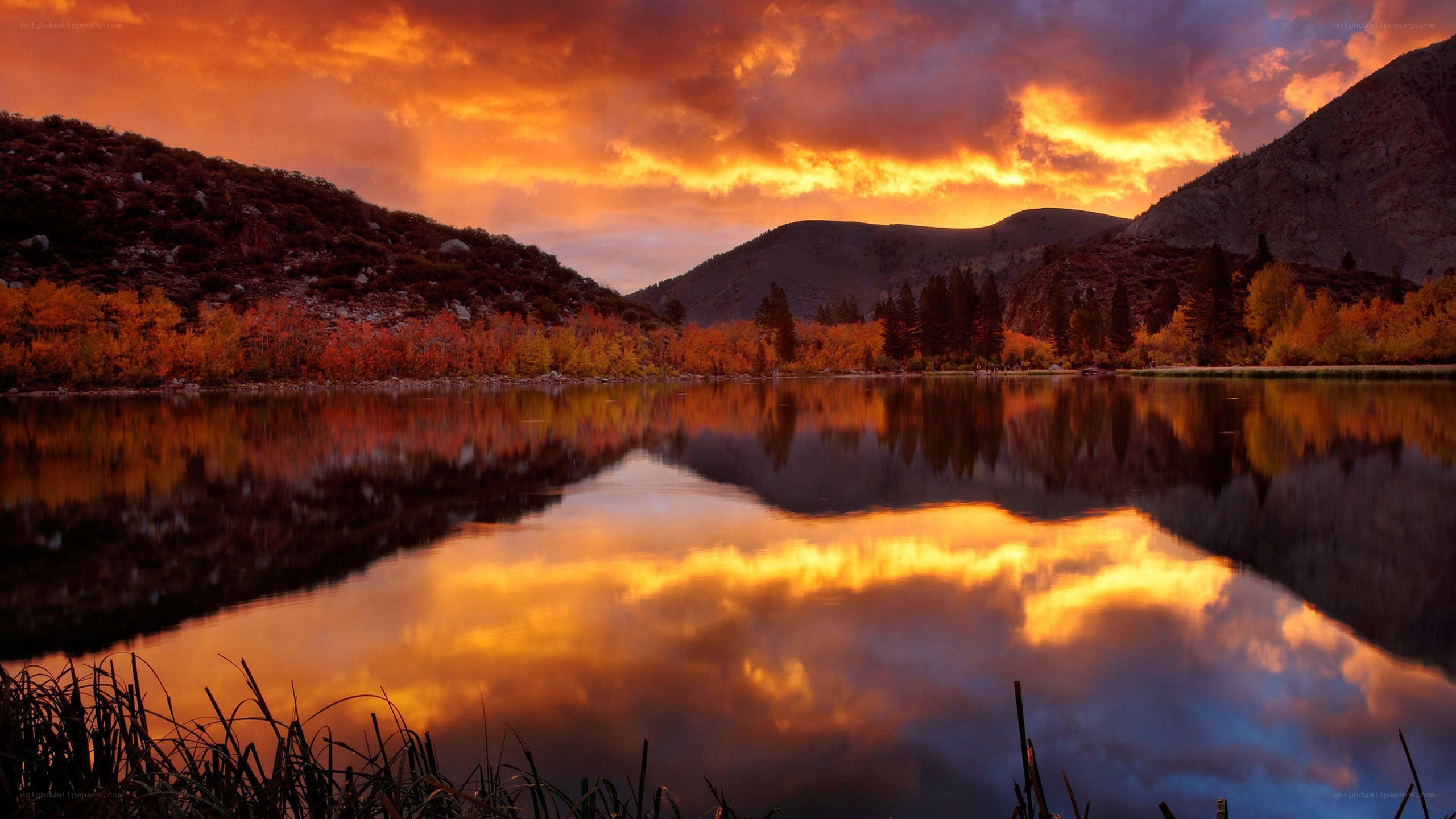 Autumn sunset over a mountain lake