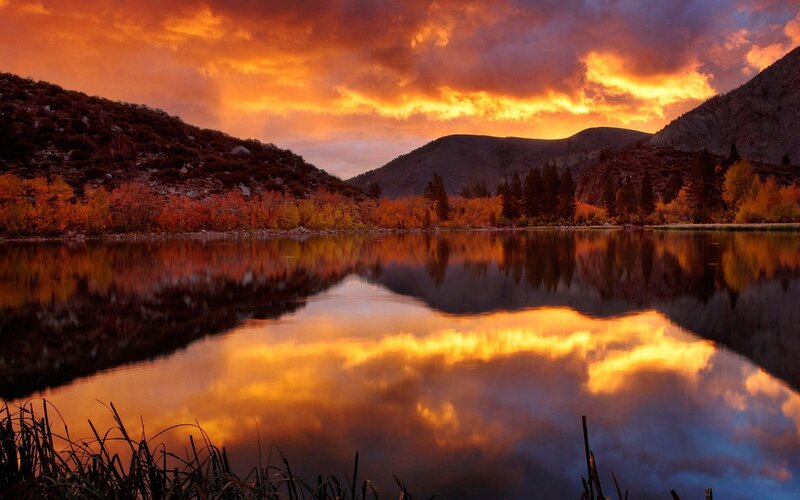 Autumn sunset over a mountain lake