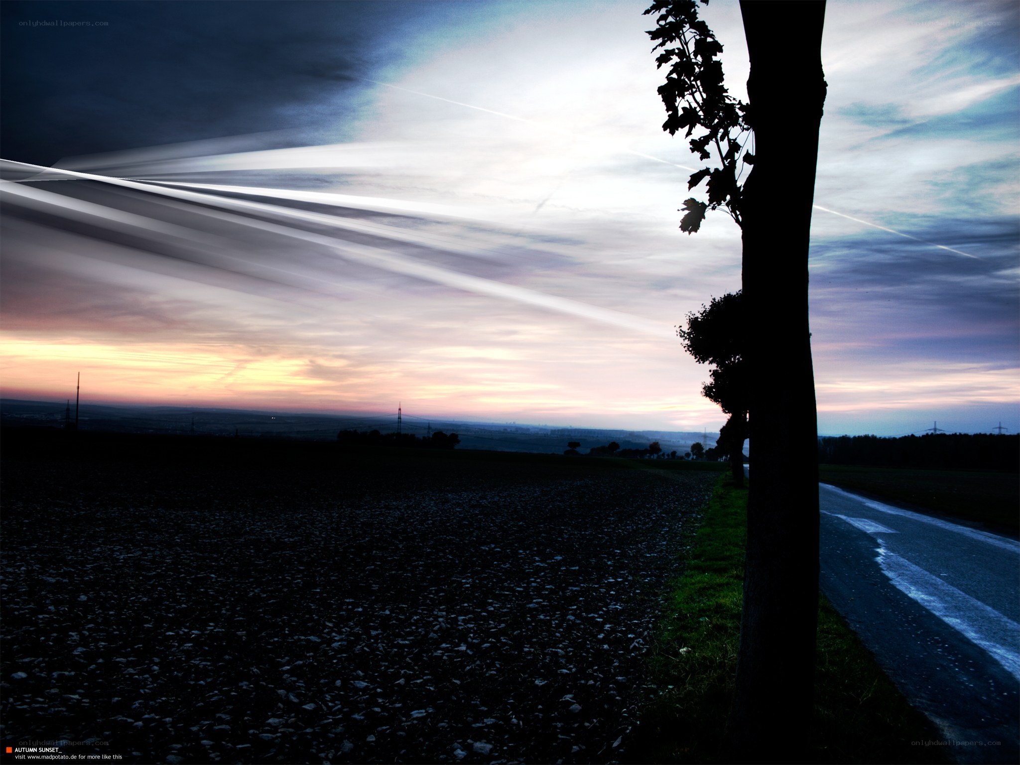 Autumn sunset with light beams