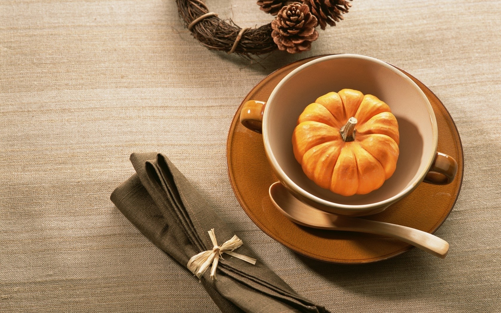 Autumn table setting with pumpkin