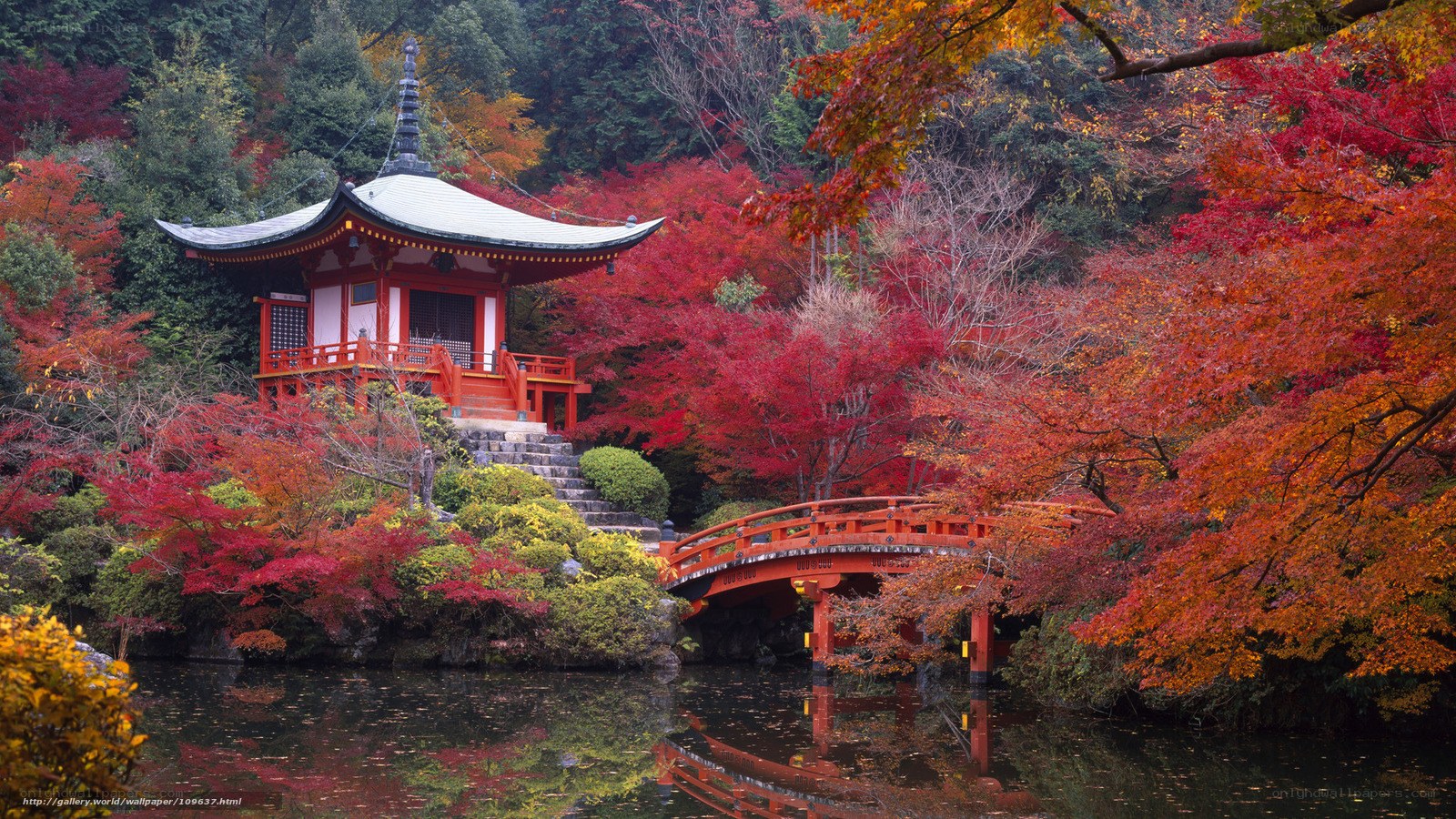 Autumn temple by a pond