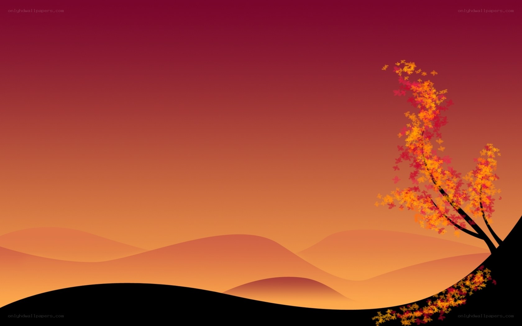 Autumn tree on hillside