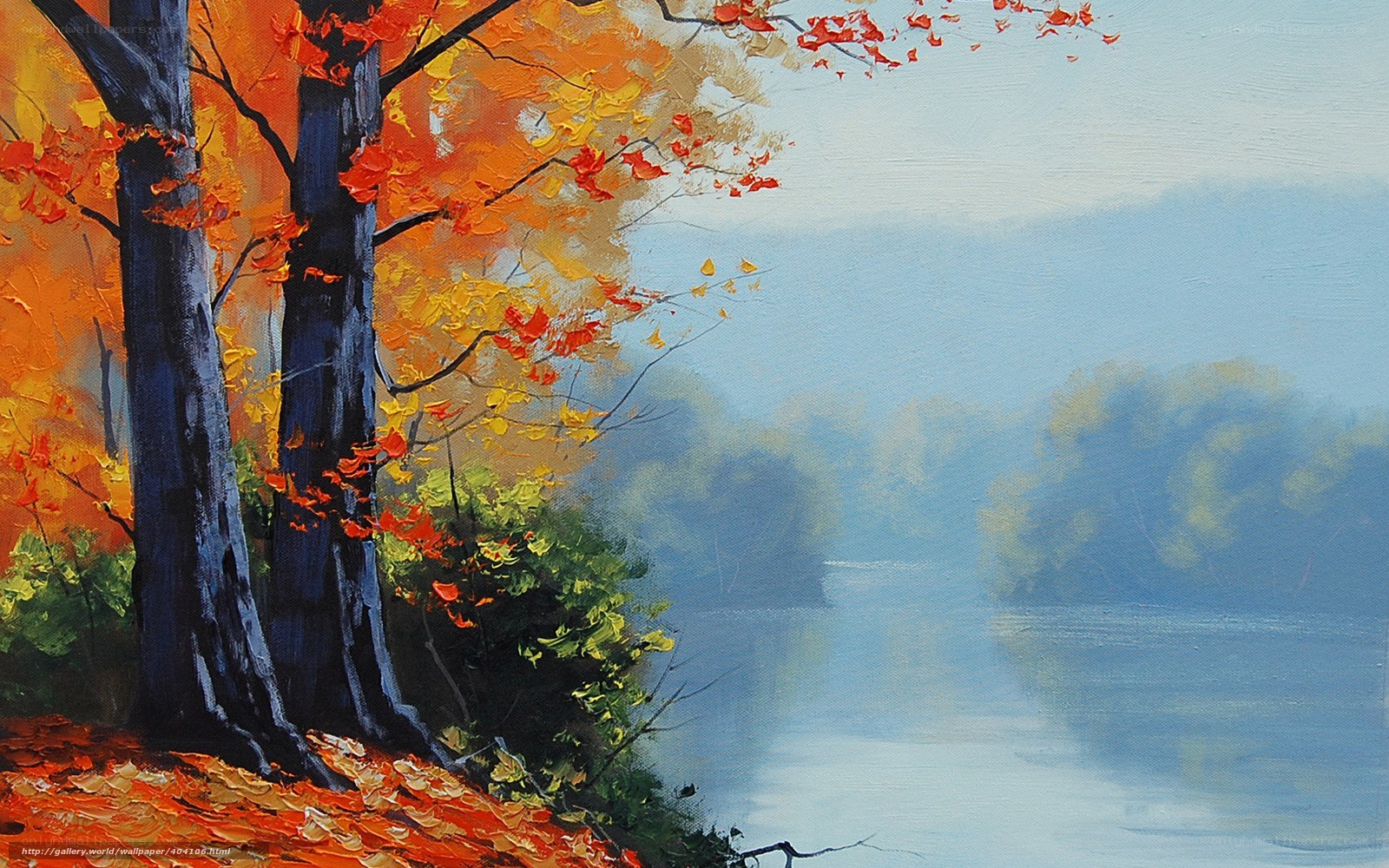 Autumn trees by a misty lake