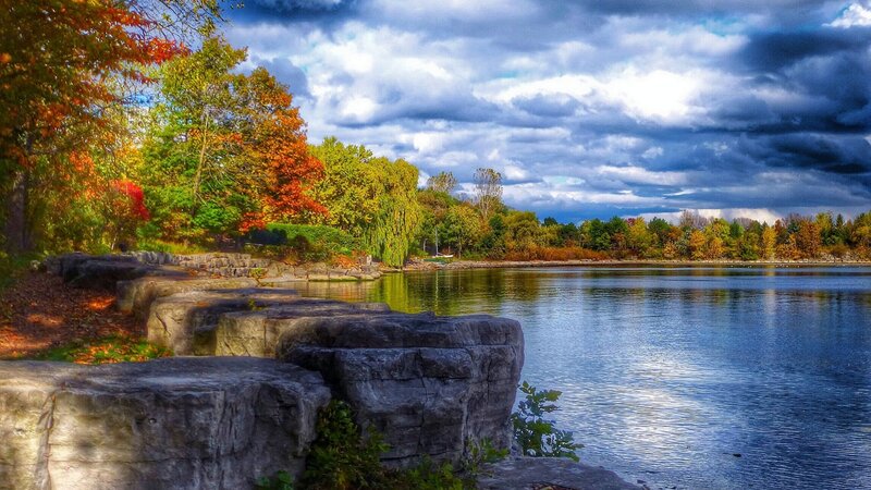 Autumn Trees by Lake — Blue, Dramatic, Photograph, Rocks