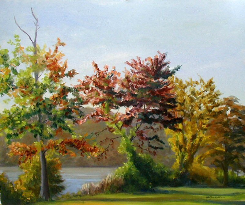 Autumn trees by the water