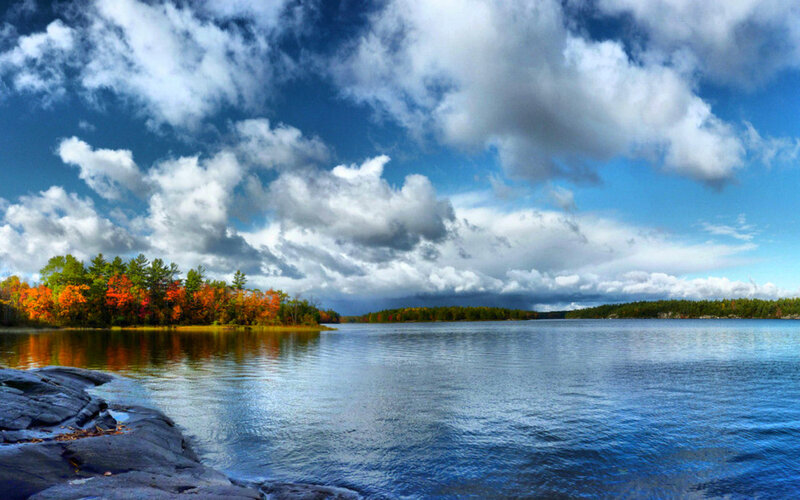 Autumn Trees on Lake Shore — Blue, Dramatic, Photograph, Clouds