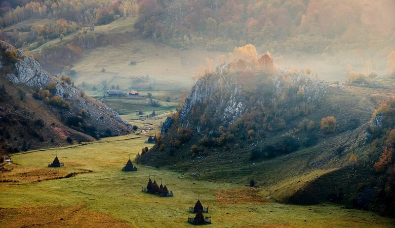 Autumn Valley with Haystacks