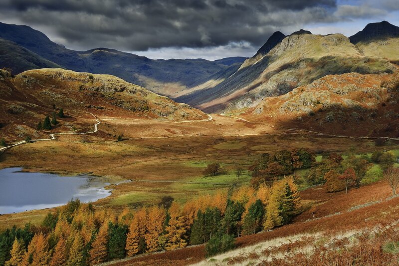Autumn valley with lake and mountains