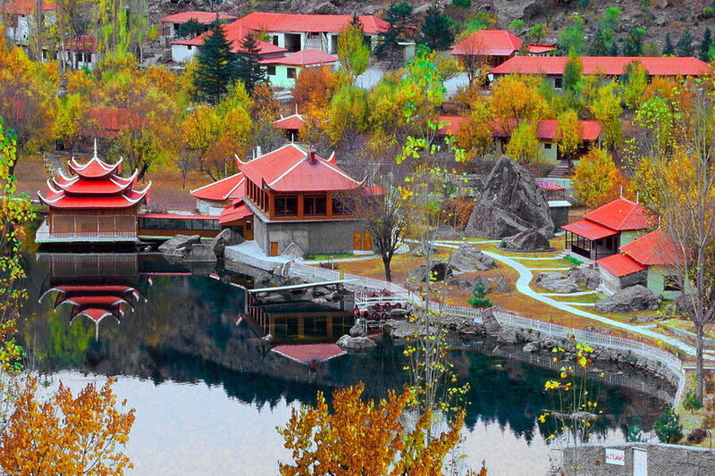 Autumn village by the lake