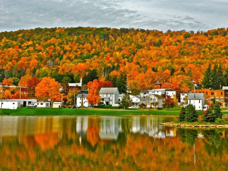 Autumn village by the lake
