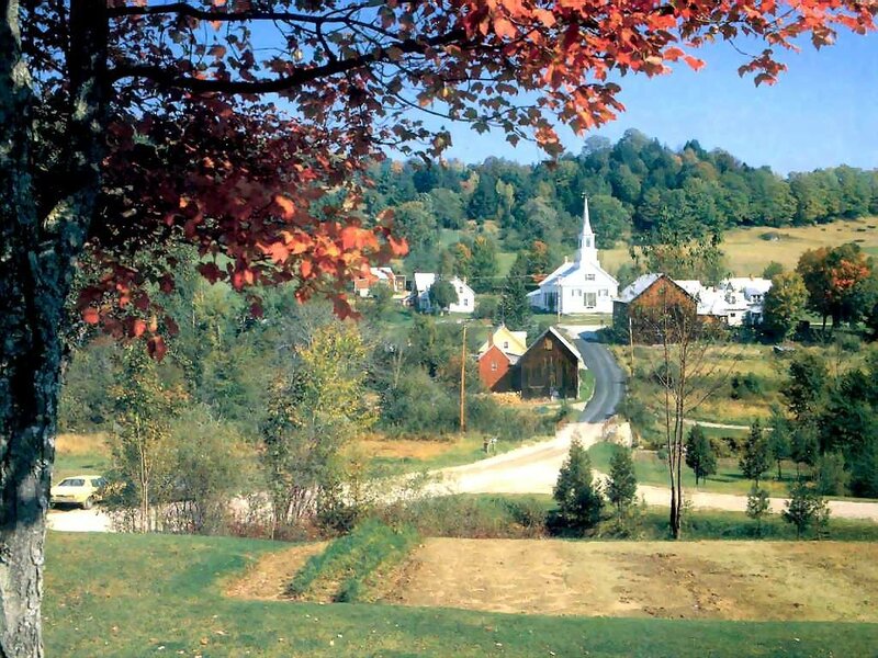 Autumn village with church