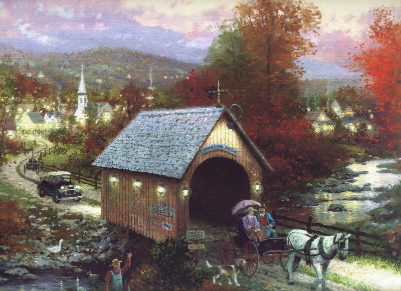 Autumn village with covered bridge