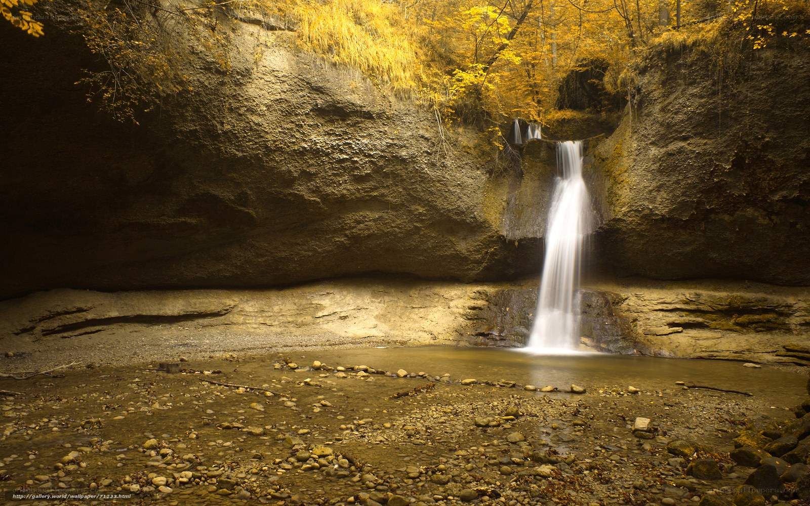 Autumn waterfall in a canyon