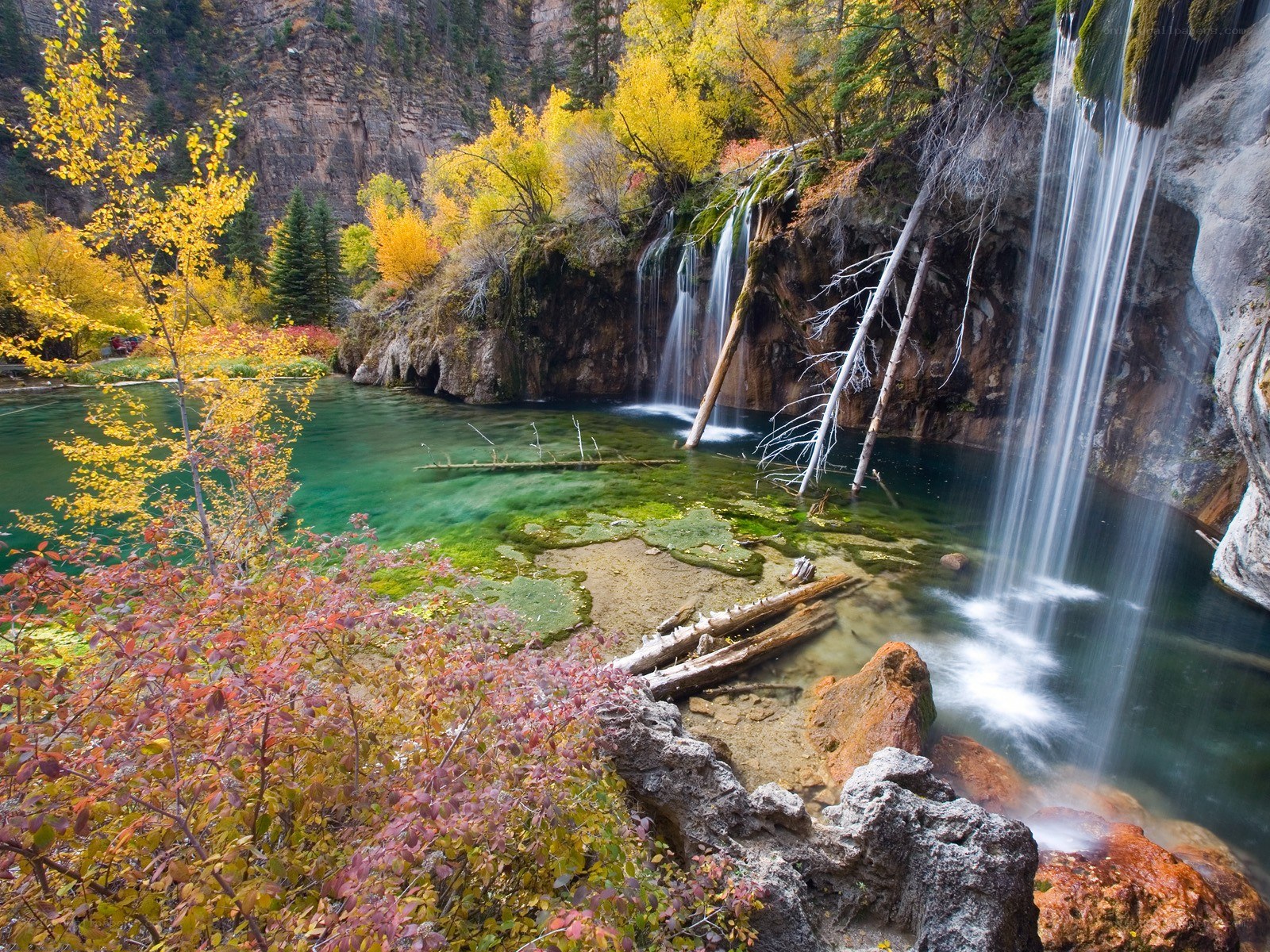 Autumn waterfall in canyon