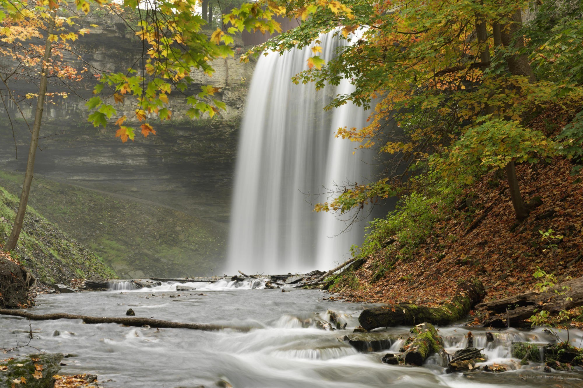 Autumn waterfall in forest