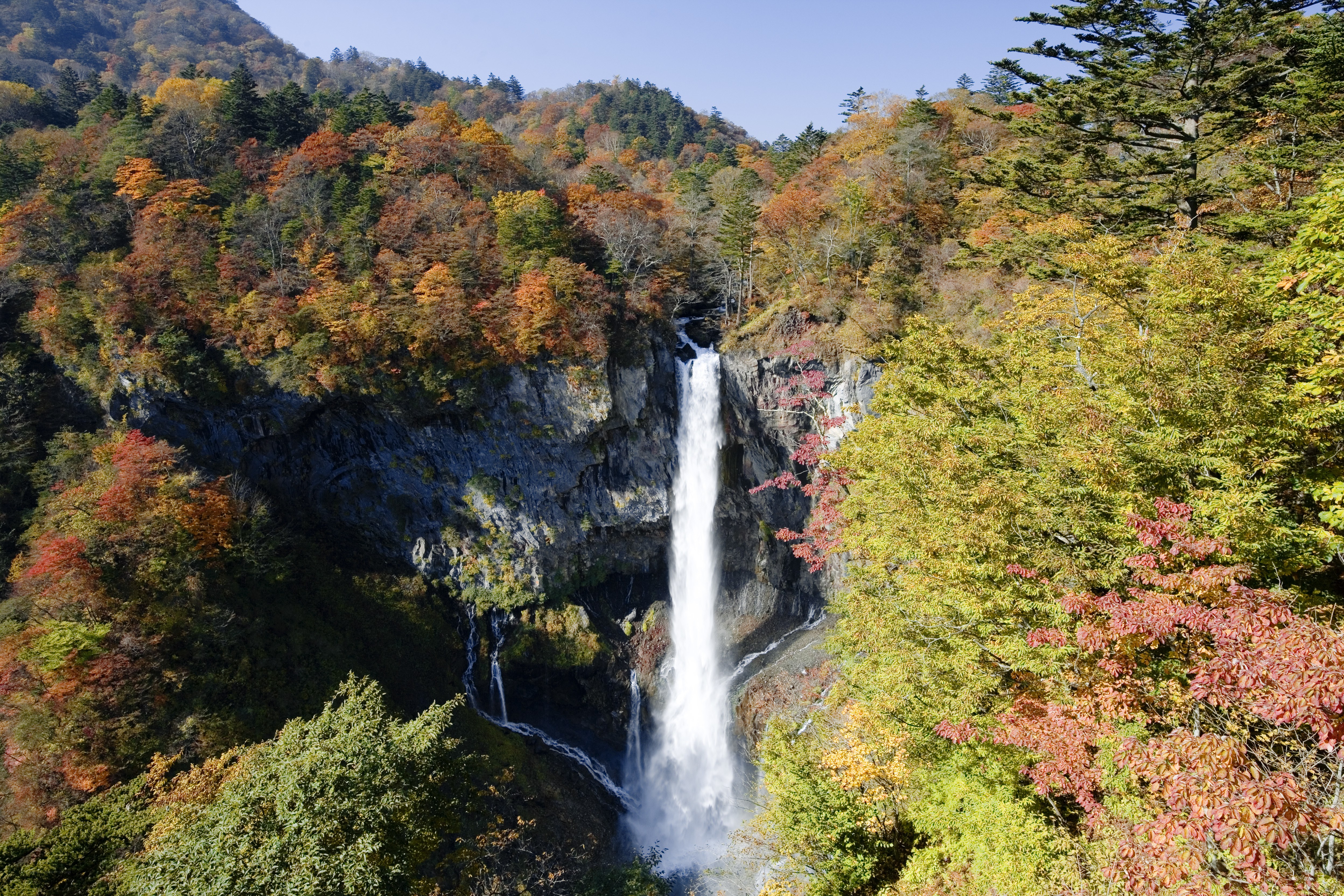 Autumn waterfall in forest