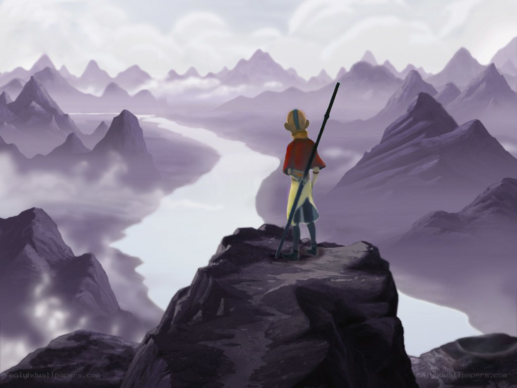 Avatar stands on a mountain peak